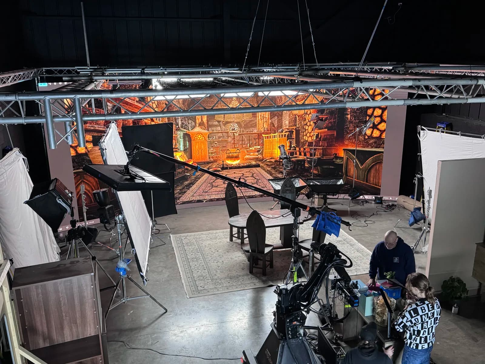Camera equipment and a fantasy backdrop on the production stage
