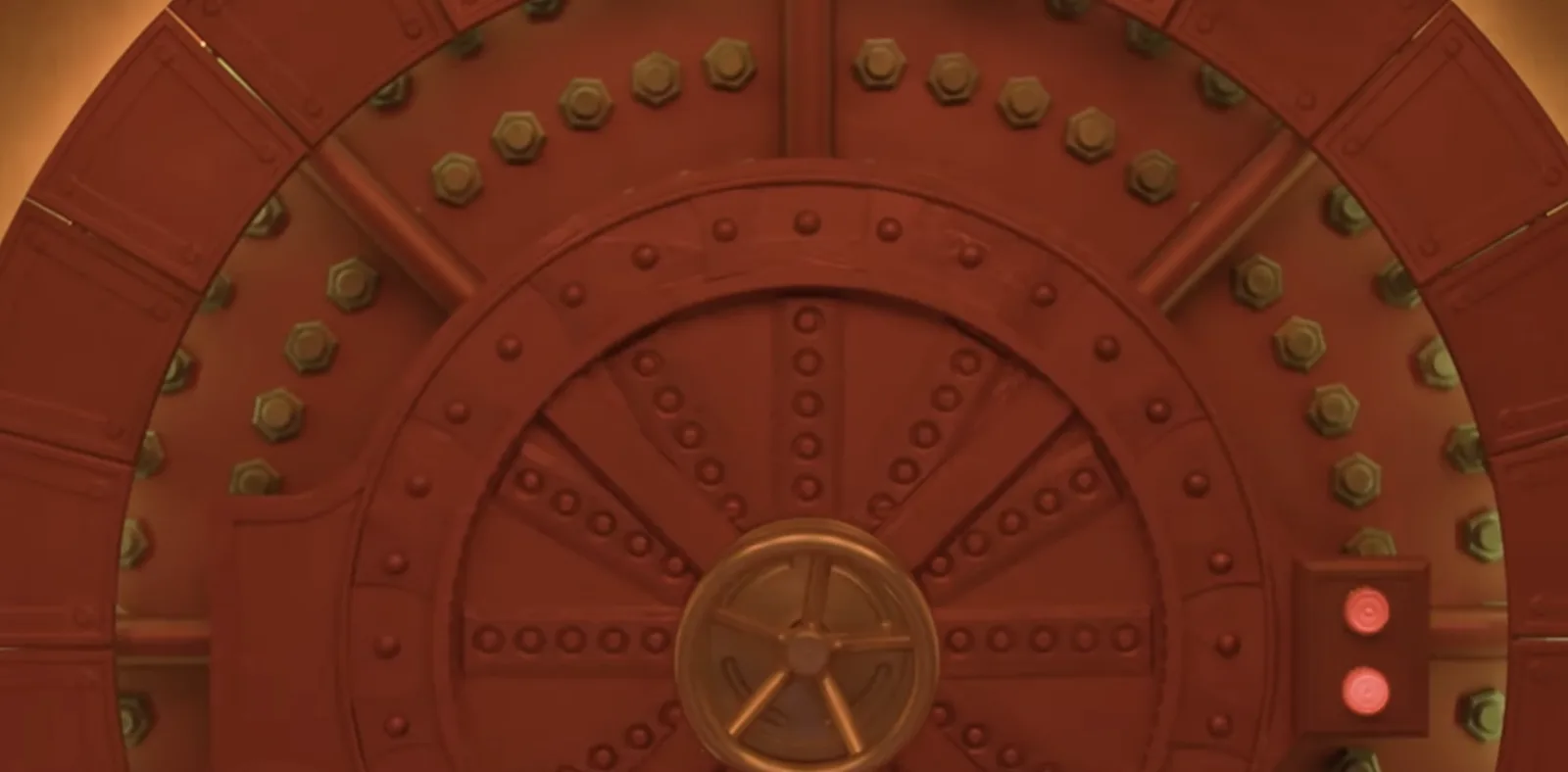 Close-up of copper vault-door panels and their illuminated ring